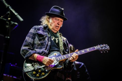 Neil Young performing in Amsterdam